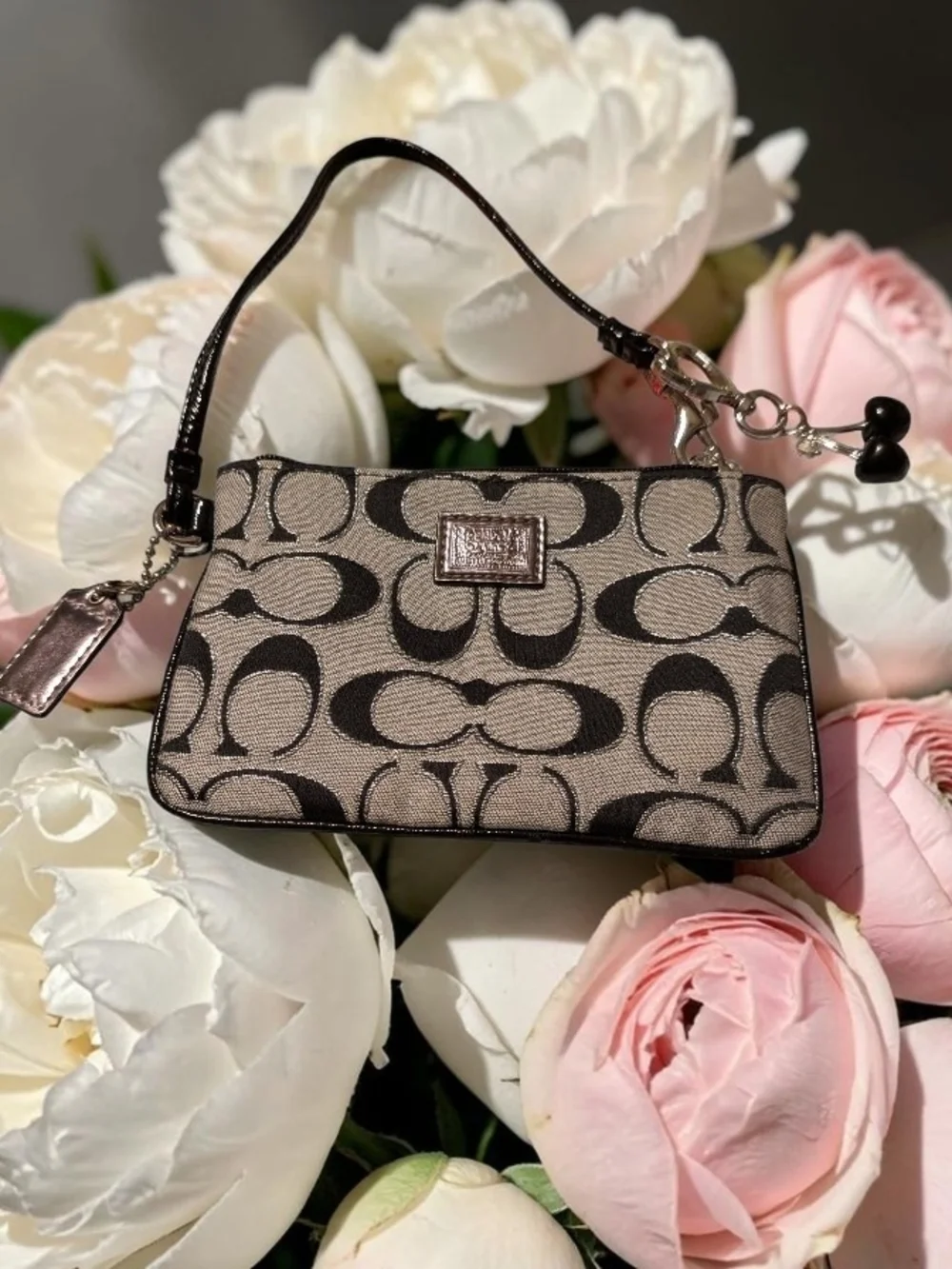 Coach Signature Poppy Canvas Wristlet in Black and Taupe